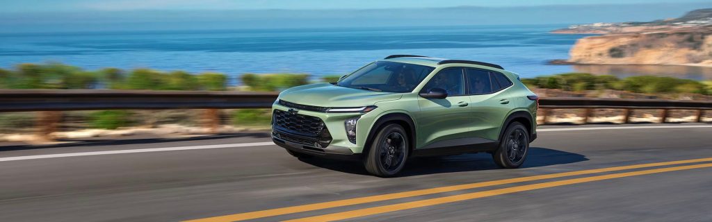 2025 Chevy Trax hauling passengers in comfort on a seaside road