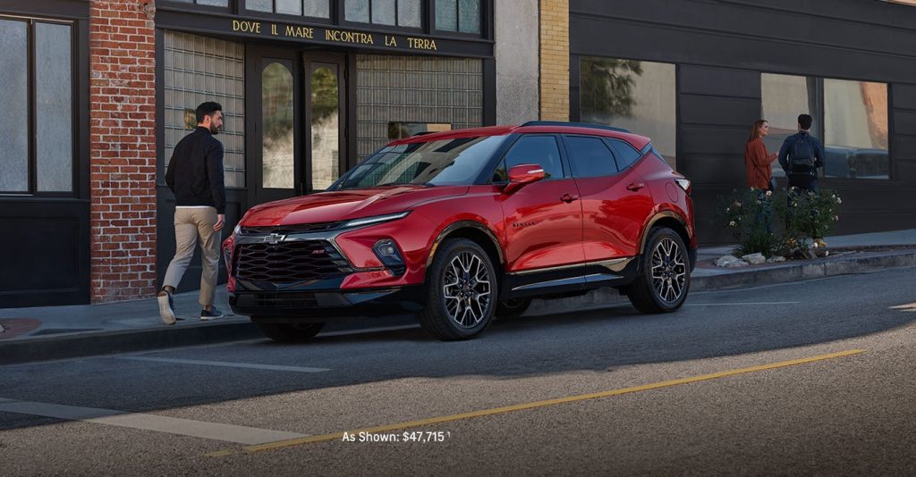 2025 Chevy Blazer parked in front of a restaurant